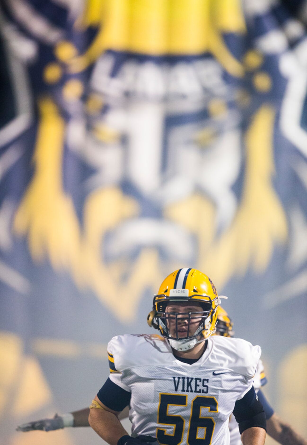 Arlington Lamar offensive lineman Gavin Kelley (56) enters the field before a UIL Class 6A...