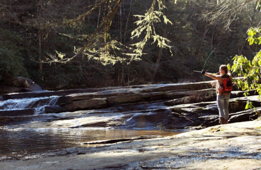 The bottom of Triple Falls at DuPont State Recreational Forest is a great place to channel...