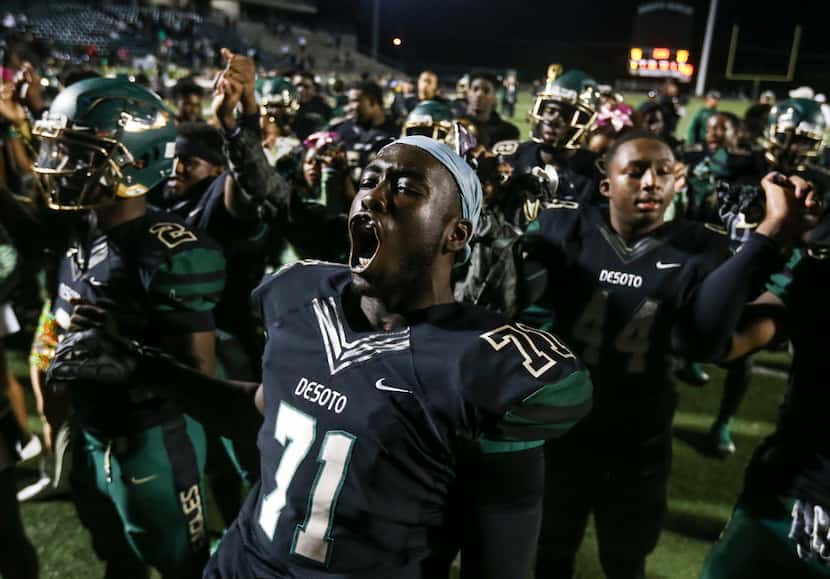 Leroy Hawkins celebrates after the Eagles' 40-21 win over Mansfield Summit at Eagle Stadium...