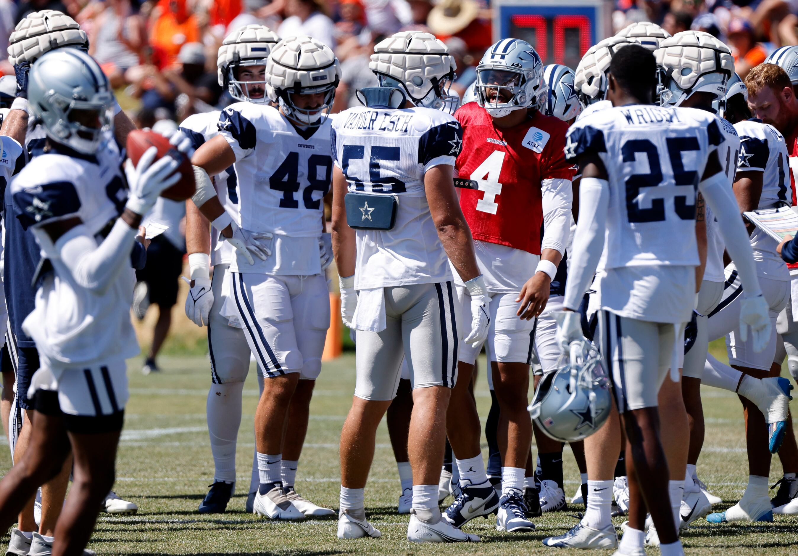 Dallas Cowboys quarterback Dak Prescott (4) rallies his team before facing the Denver...