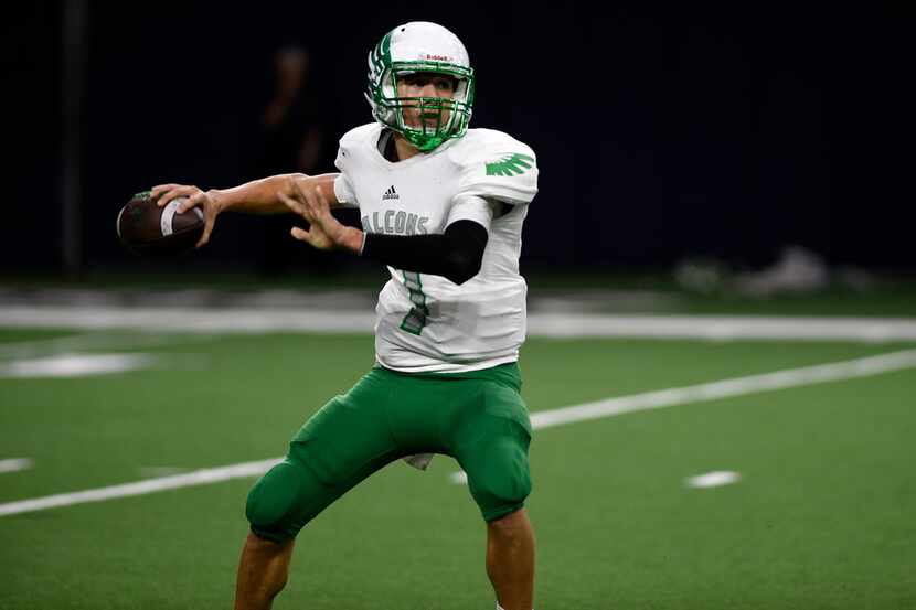 Lake Dallas junior quarterback Ryan Depperschmidt (7) passes the ball to a teammate. Lake...