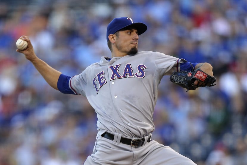 KANSAS CITY, MO - SEPTEMBER 21:  Starting pitcher Matt Garza #22 of the Texas Rangers throws...