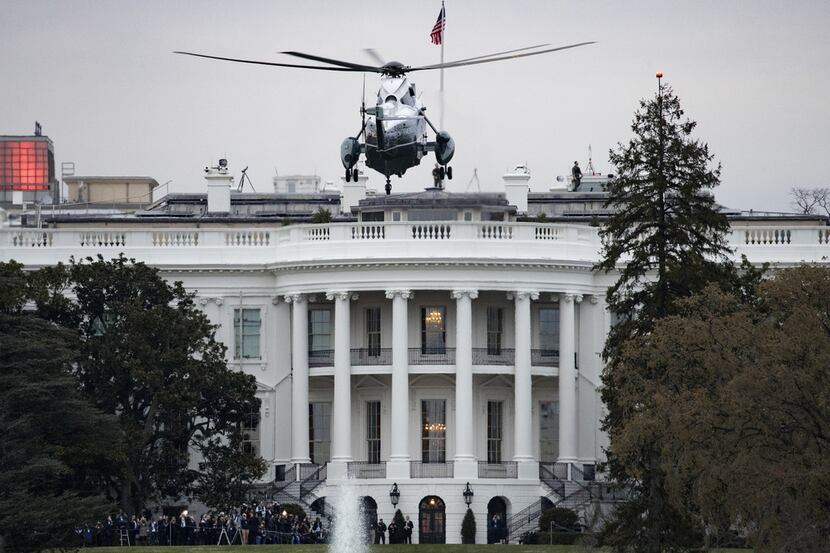 Marine One, with President Donald Trump on board, prepared to land on the South Lawn of the...
