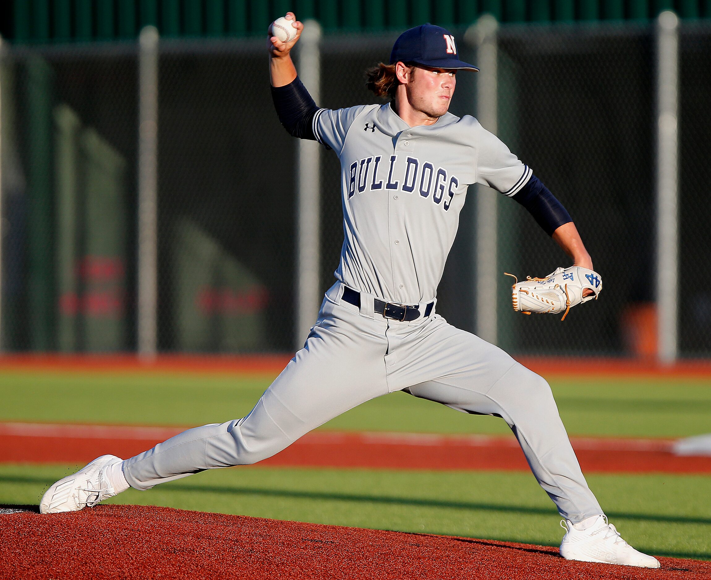 McKinney North pitcher Dylan Rogers (9) throws a pitch in the second inning during game one...