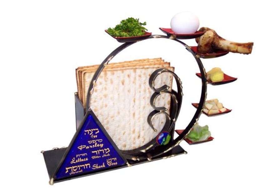 
The newest Seder plate (above) by Gary Rosenthal, $250, doubles as a centerpiece and...