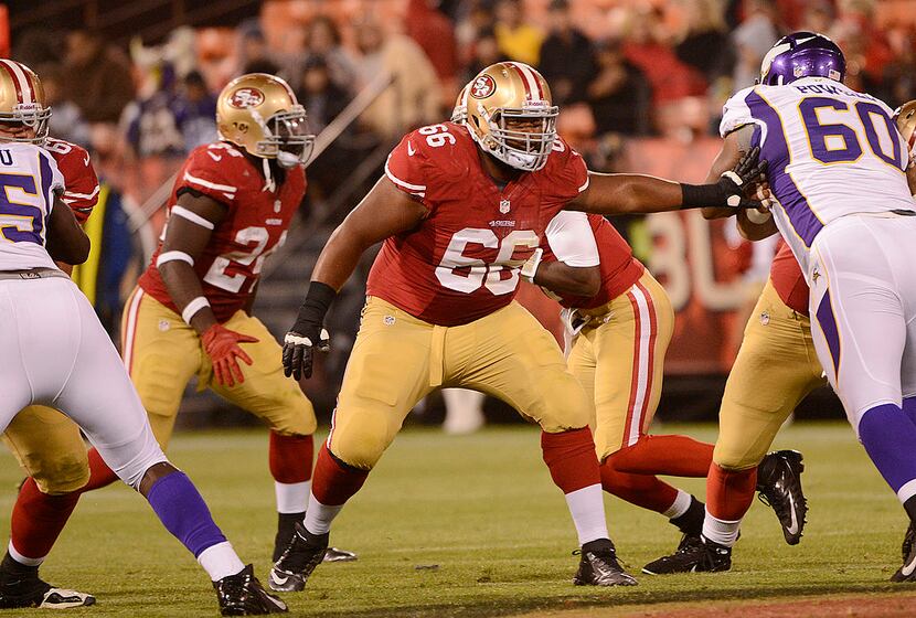 SAN FRANCISCO, CA - AUGUST 10:  Joe Looney #66 of the San Francisco 49ers backs up to pass...