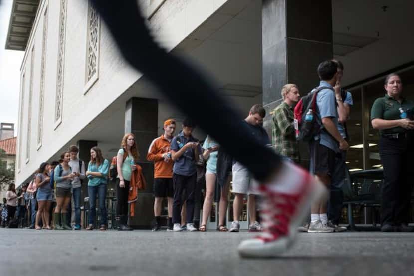 
Voters waited in line to cast their ballots at the Flawn Academic Center on the University...