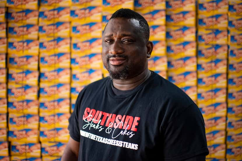 Chris Easter stands in front of dozens of boxes of Duchess honey buns. Before the State Fair...