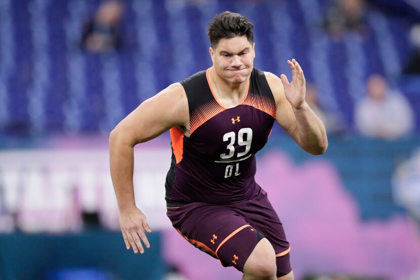 Penn State offensive lineman Connor McGovern runs a drill at the NFL football scouting...