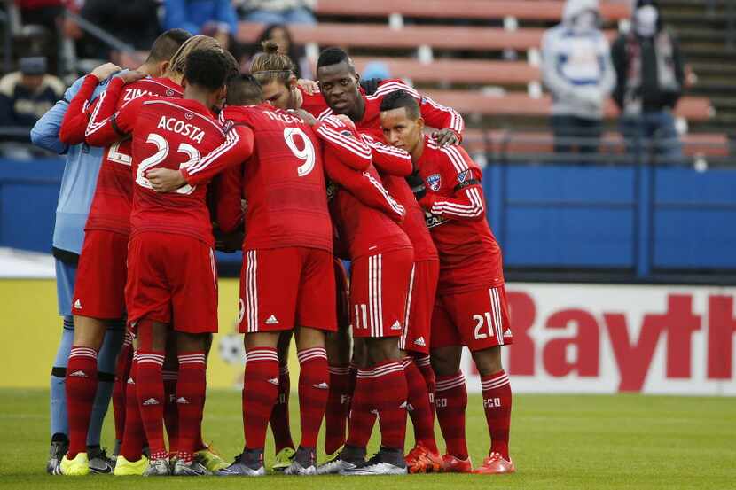 FC Dallas players meet before the final leg of the MLS Western Conference Finals between the...