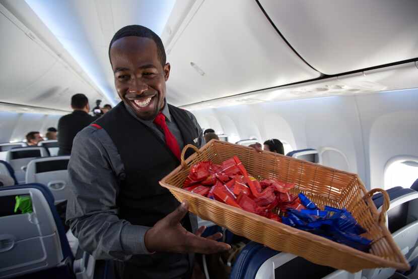 Southwest Airlines employees showed off the company's new uniform design during a flight...
