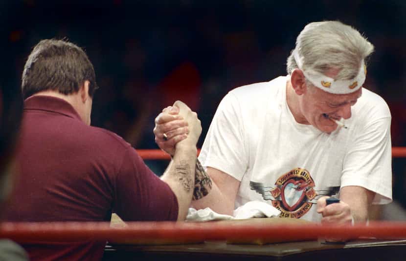 Former Southwest Airlines CEO Herb Kelleher arm wrestles Kurt Herwald, CEO of Stevens...