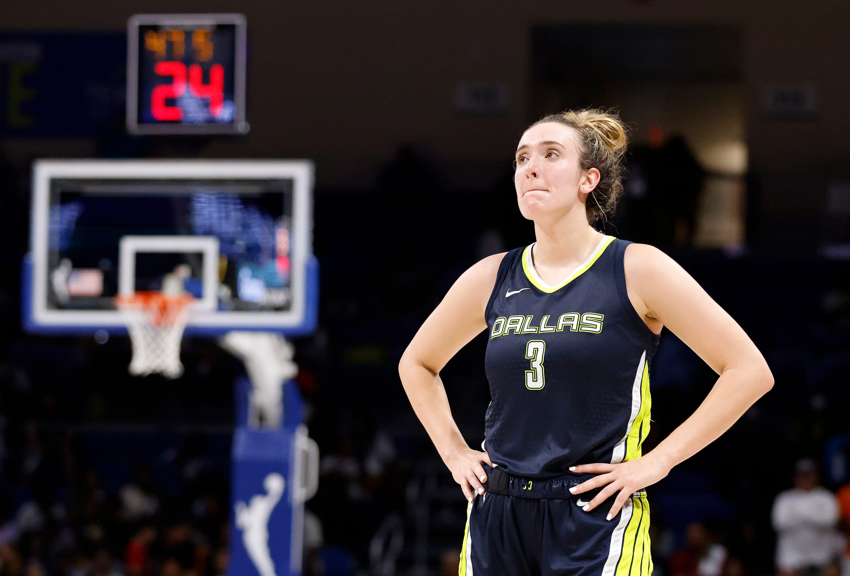 Dallas Wings guard Marina Mabrey (3) watches as the final minute ticks off the clock in...