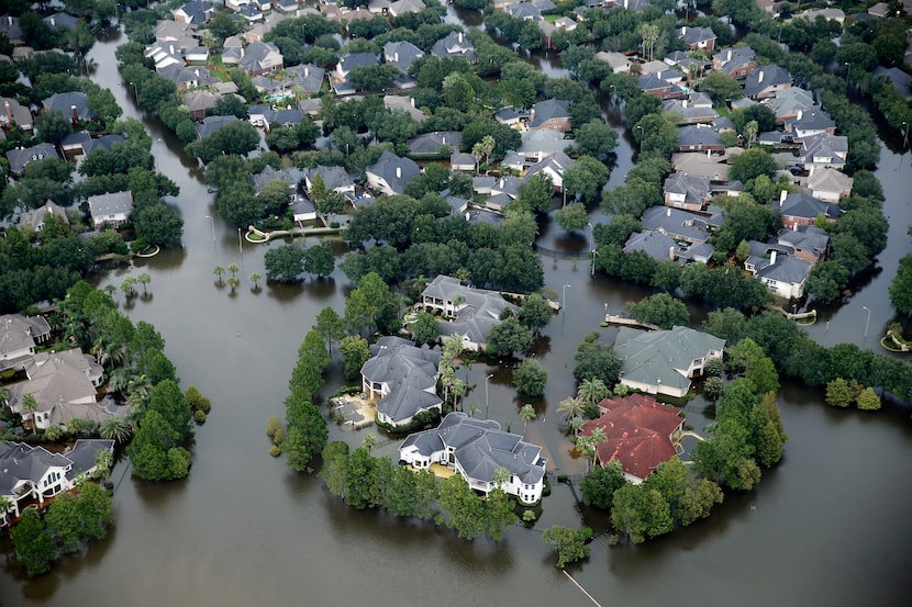 A flooded neighborhood off North Eldridge Parkway near the Addicks Reservoir in West...