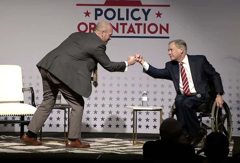 Gov. Greg Abbott, shown fist-bumping with Texas Public Policy Foundation executive director...