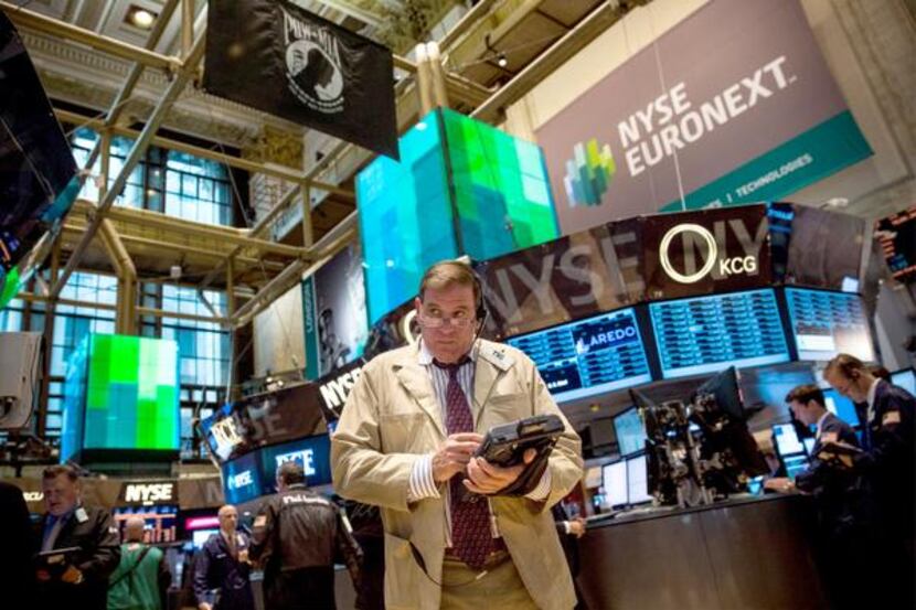 
A trader at the New York Stock Exchange has seen the market turn from steaming ahead to...