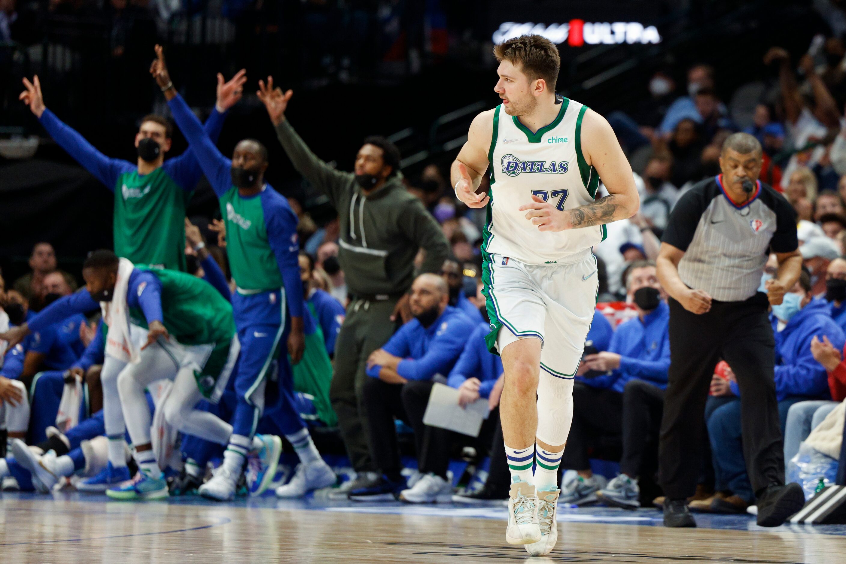 Dallas Mavericks guard Luka Doncic (77) celebrates a three-pointer during the fourth quarter...