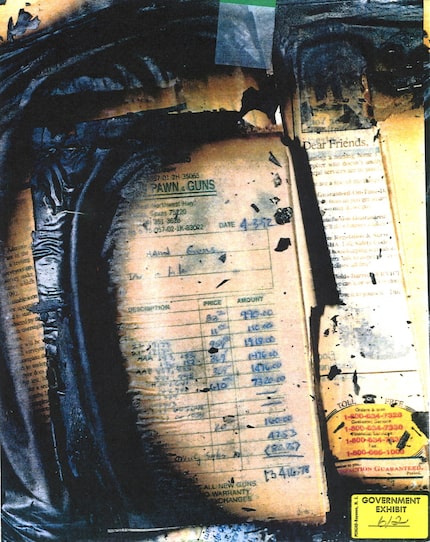 A government evidence photo of a charred receipt for over $13,000 in goods purchased from a...