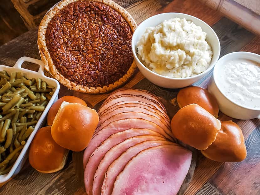 Soulman's Bar-B-Que offers a holiday meal featuring spiral slice ham, green beans, mashed...