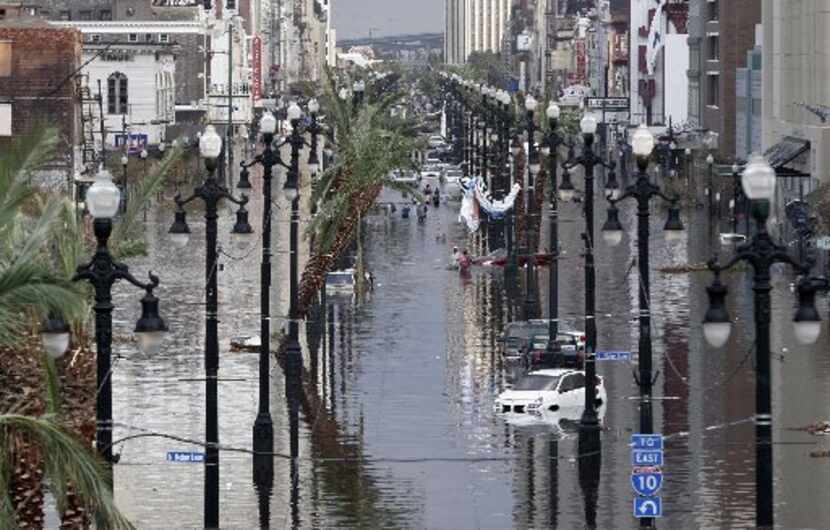 Canal Street is flooded one day after Hurricane Katrina struck New Orleans in 2005.