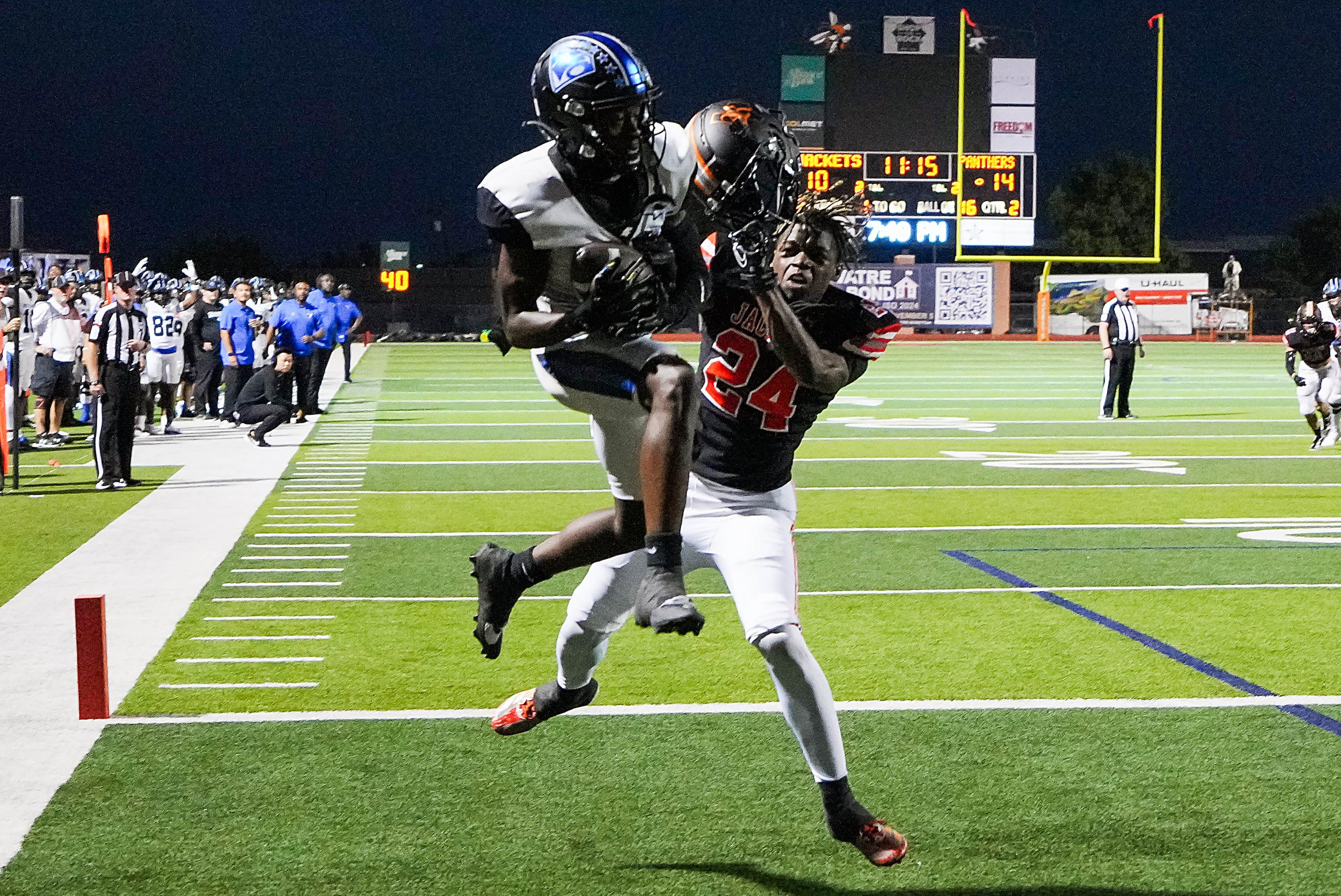 North Crowley wide receiver Quentin Gibson (6) catches a touchdown pass over Rockwall...