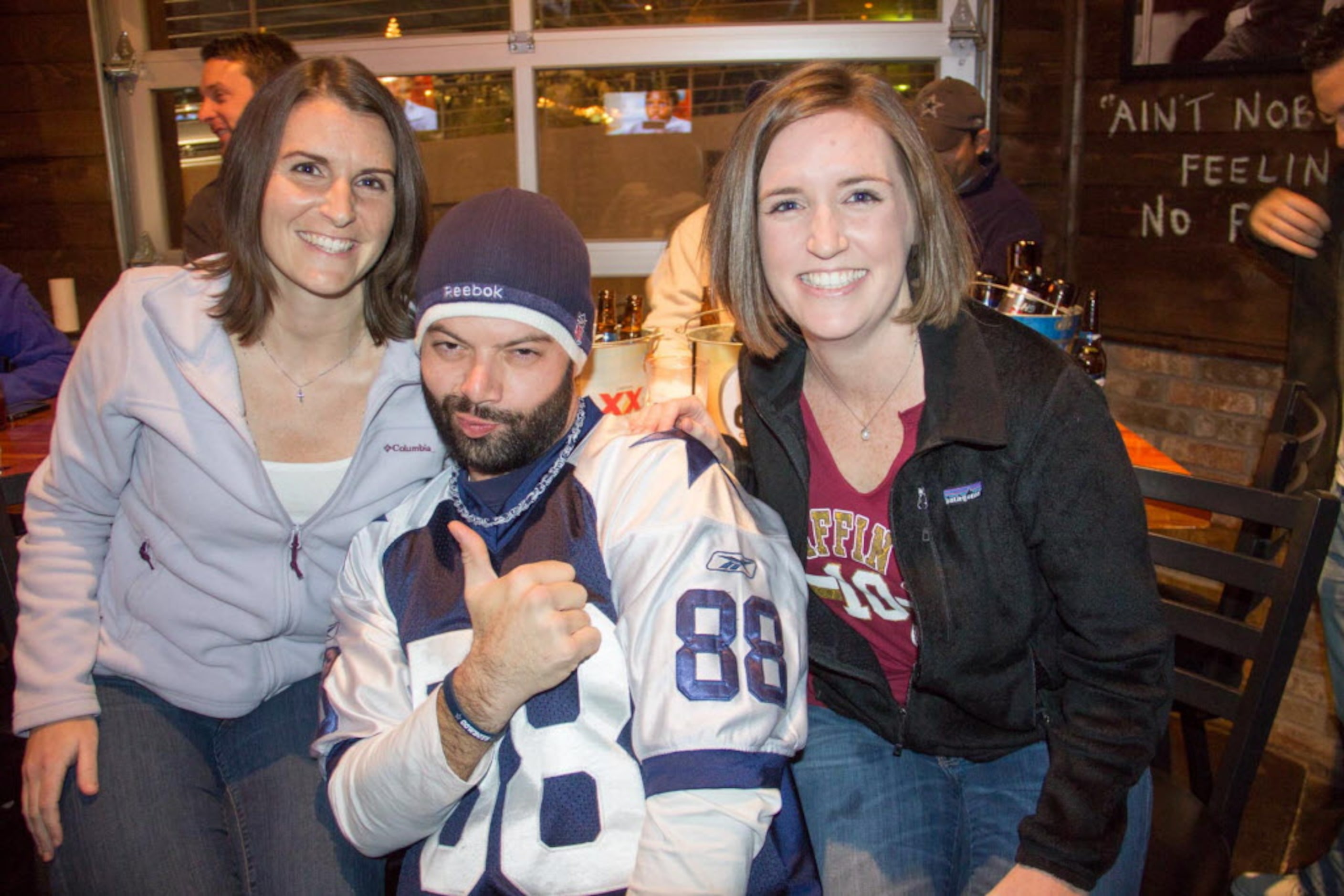 Niki Leete, David Gannon and Mo Harpole cheering on their teams at Nodding Donkey near SMU...