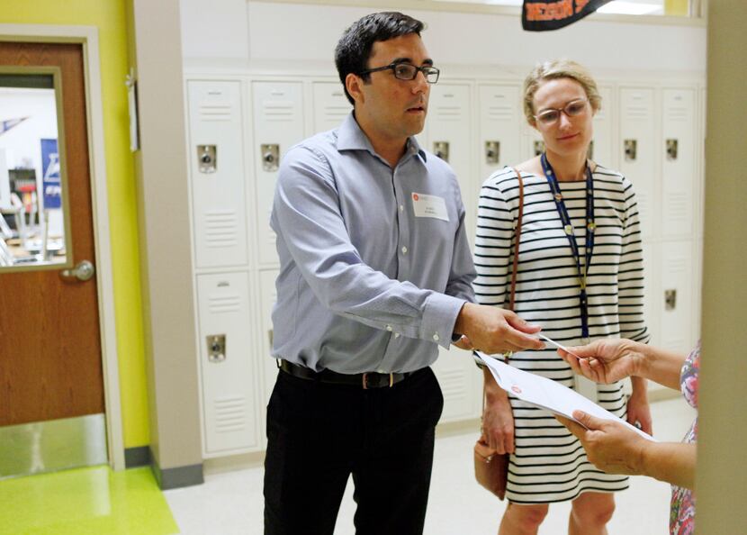 SMU law student Jake Torres helps a tenant at an emergency legal clinic set up on Wednesday...