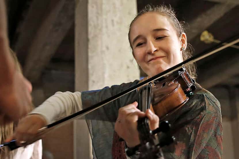 
Leah Sawyer, 14, of Weatherford practiced alongside other musicians before competing in the...