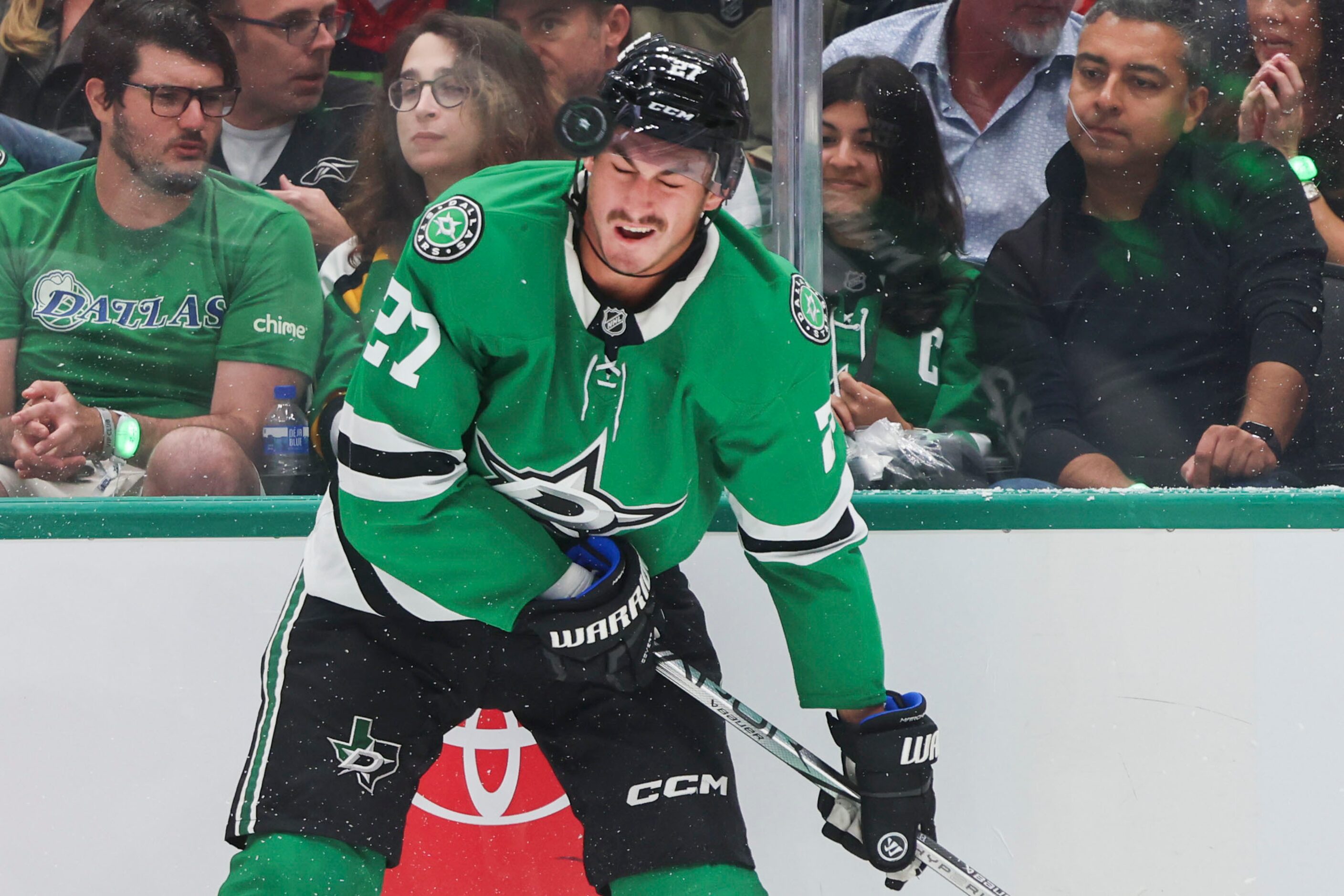 Dallas Stars left wing Mason Marchment reacts as the puck flies by his helmet during the...