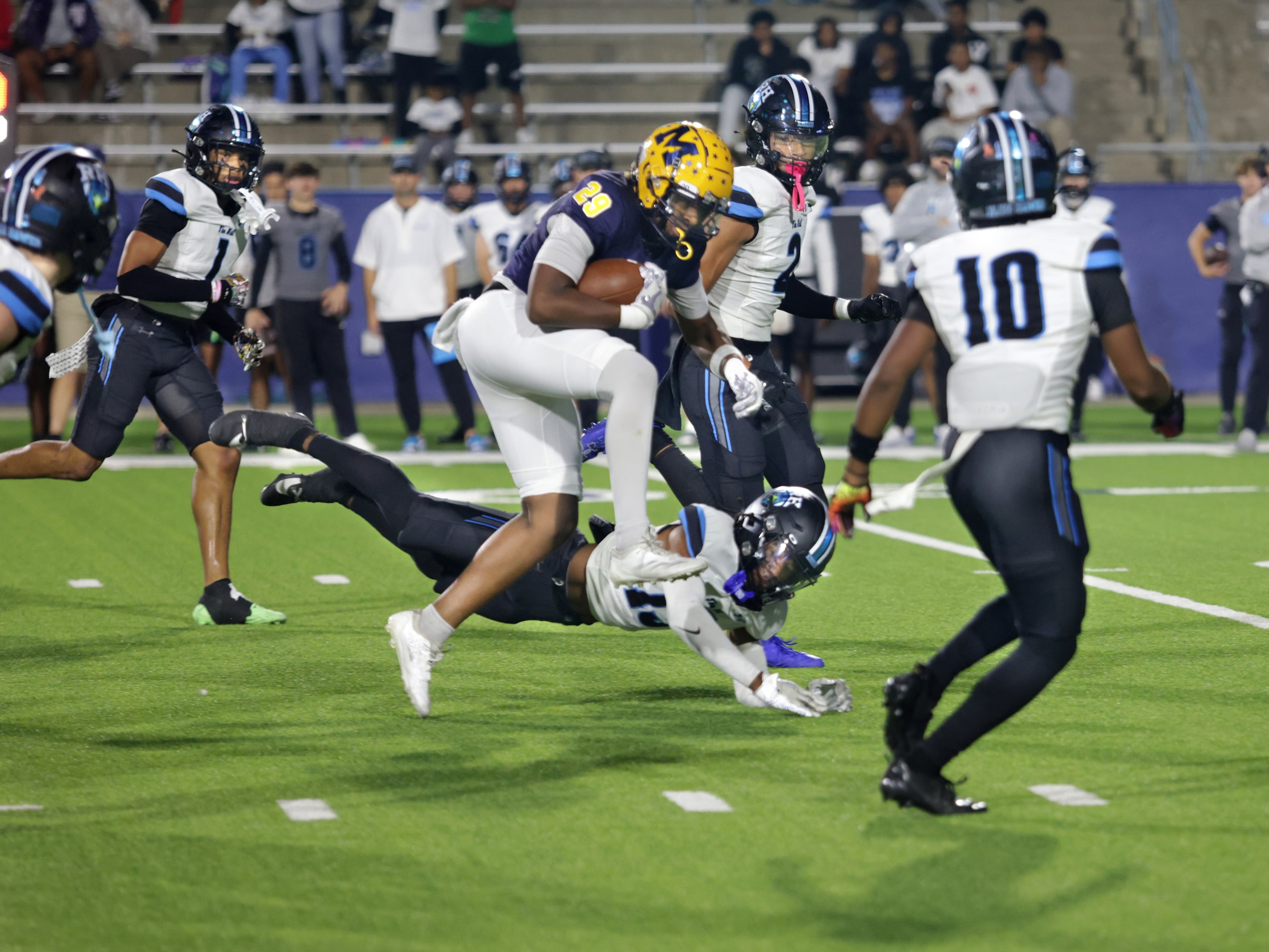 McKinney player #29 Makaden Frazier runs the ball during the Prosper Rock Hill High School...