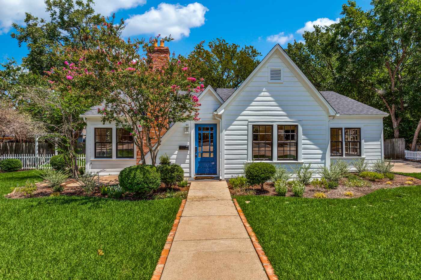 The 1930s Tudor-style cottage was recently updated and is move-in ready.