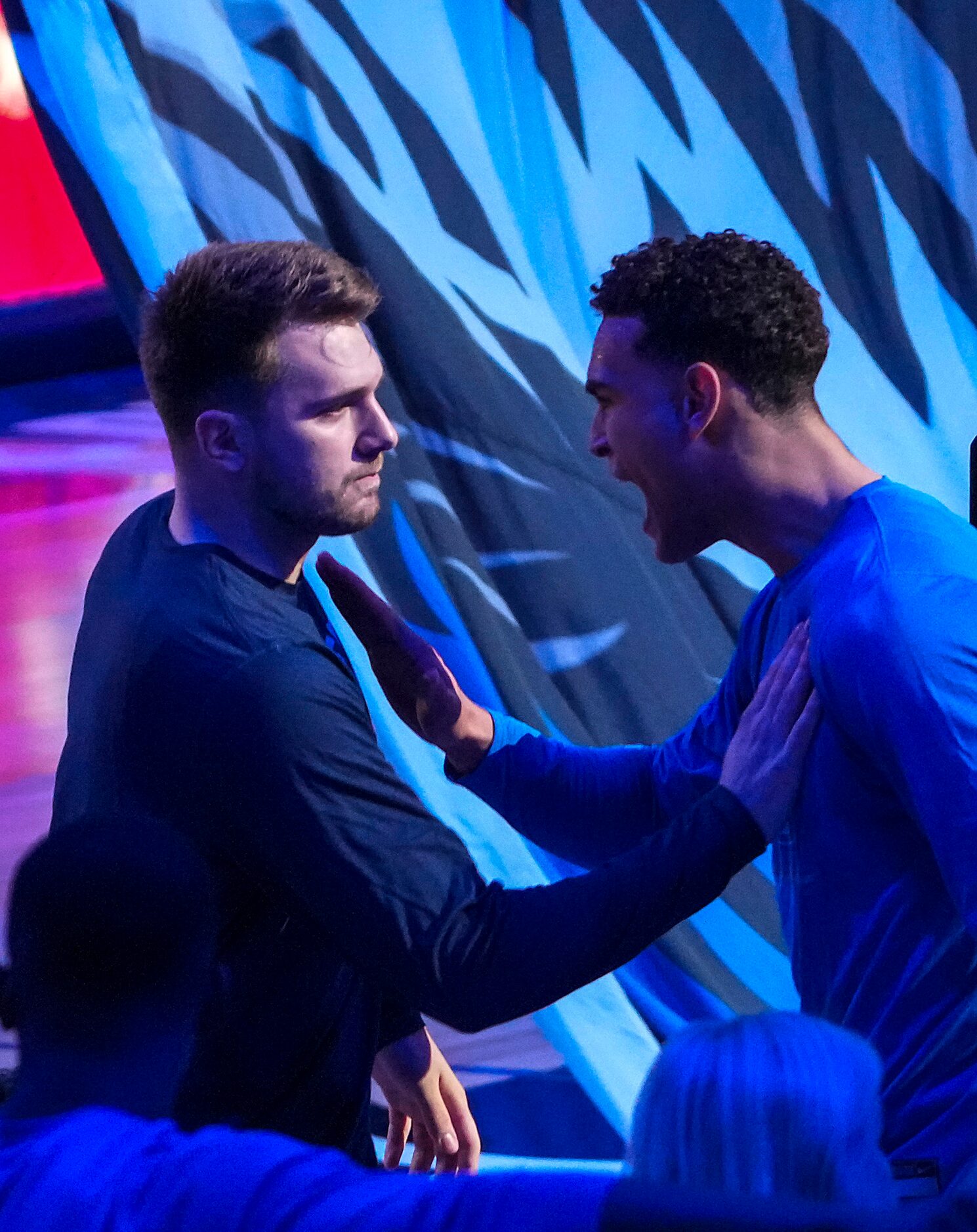 Dallas Mavericks guard Luka Doncic (left) and center Dwight Powell take the court before...