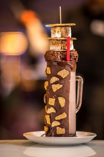 The Campfire Spiked S'mores Milkshake at Sugar Factory costs $31 and is a stacked-high shake...