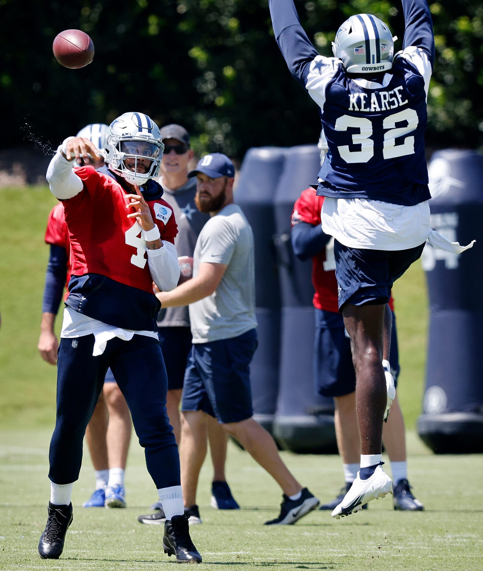 Dallas Cowboys quarterback Dak Prescott (4) attempts to throw over leaping safety Jayron...