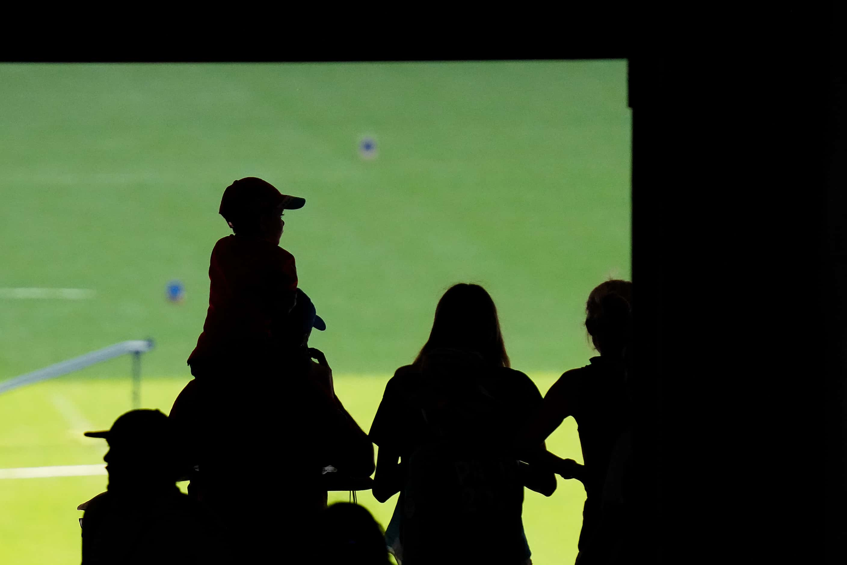 Fans watch the opening morning of athletics at the 2024 Summer Olympics on Friday, Aug. 2,...