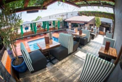 The Whiskey Garden's courtyard is home to more than just the pool; there's booth-style...