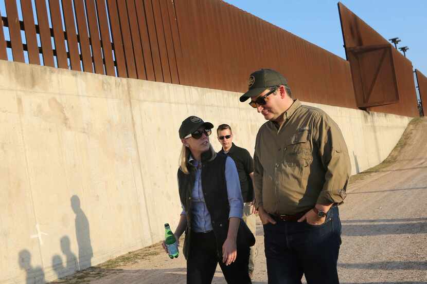 Sen. Ted Cruz, right, walks with Homland Security Secretary Kirstjen Nielsen while touring...