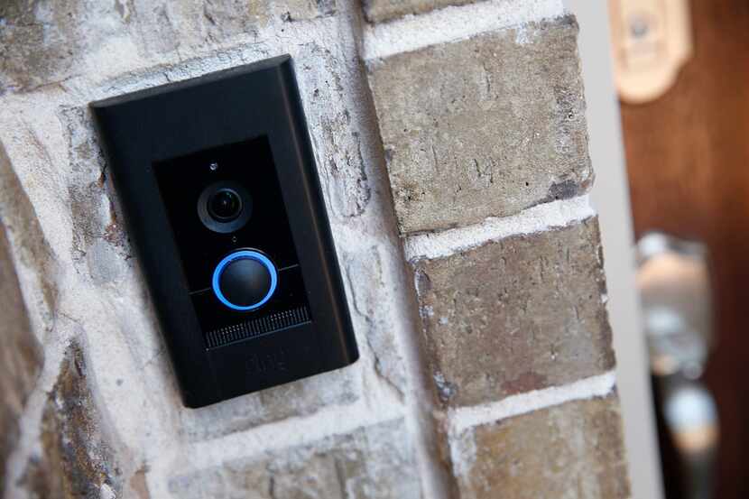 An Amazon Ring doorbell, which has a camera to monitor visitors, is installed at an Amazon...