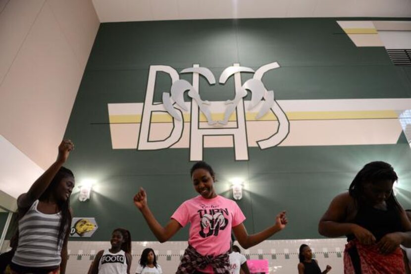 
Dance captains (from left) Cindie Ngomege, Onyinye Ekemezie and Evelyn Pearson of the...