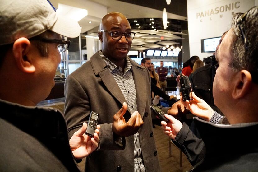 DeMarcus Ware speaks to reporters during a press conference and community meeting to launch...