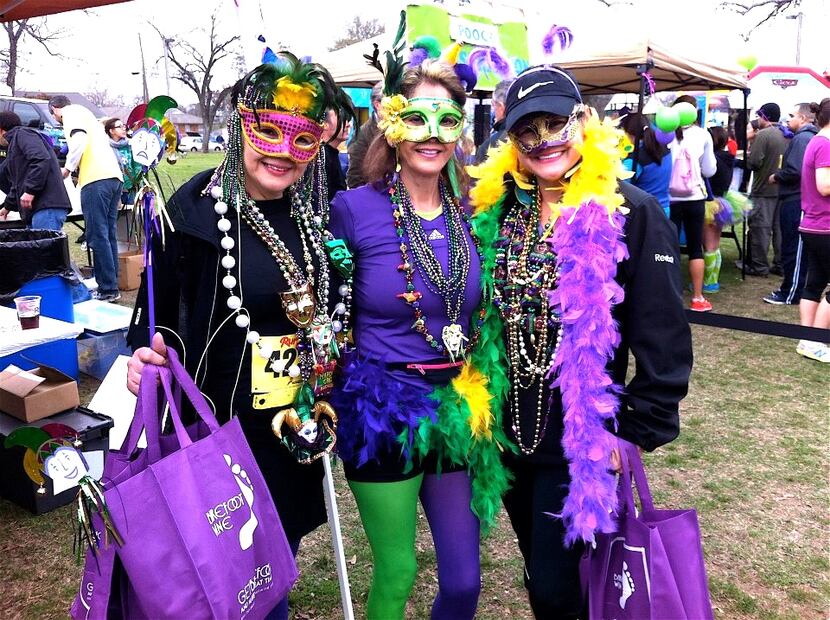 Colorful costumes are always part of the attraction at the annual Dash for the Beads fun run.
