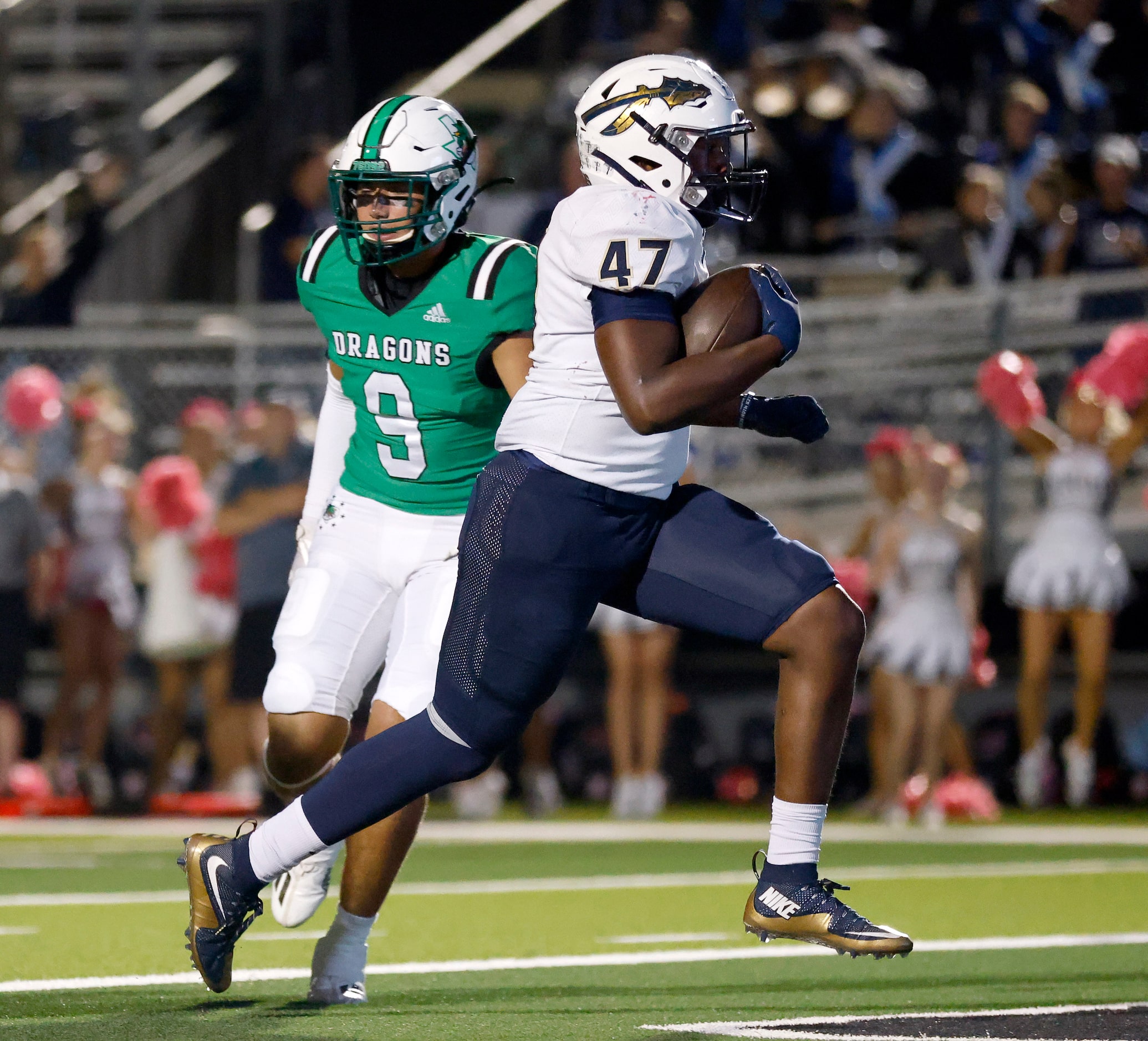 Keller running back Jayden Hart (47) scores a second quarter touchdown in front of Southlake...