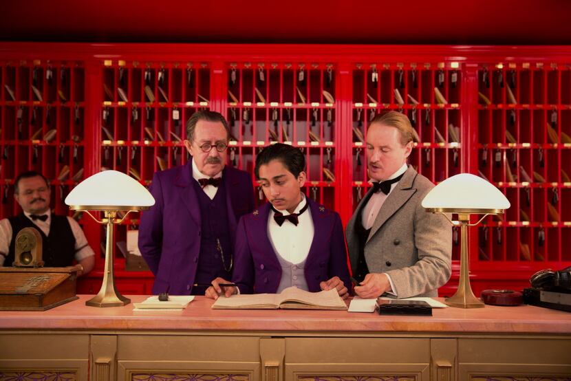 Tom Wilkinson, Tony Revolori, center, and Owen Wilson, right,  in "The Grand Budapest Hotel ."