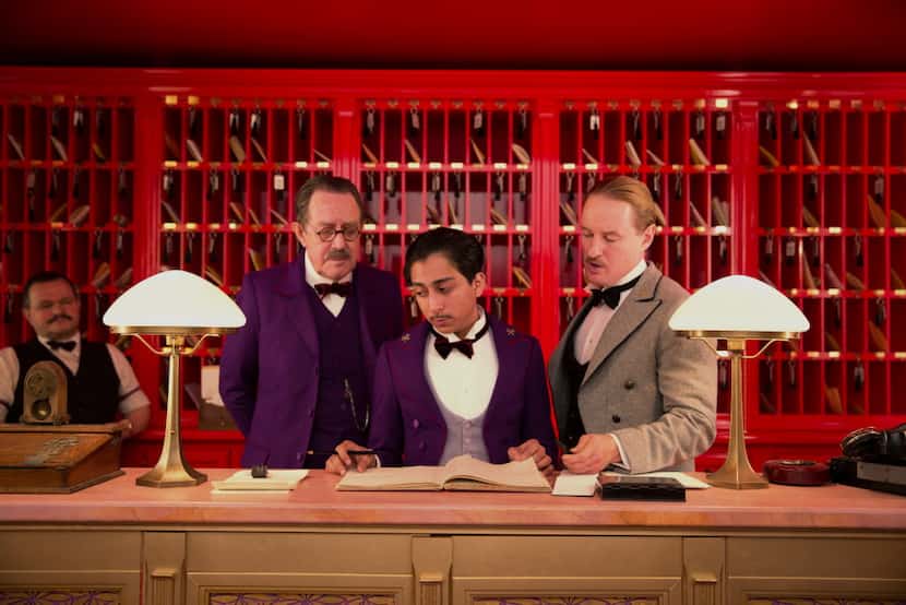 Tom Wilkinson, Tony Revolori, center, and Owen Wilson, right,  in "The Grand Budapest Hotel ."