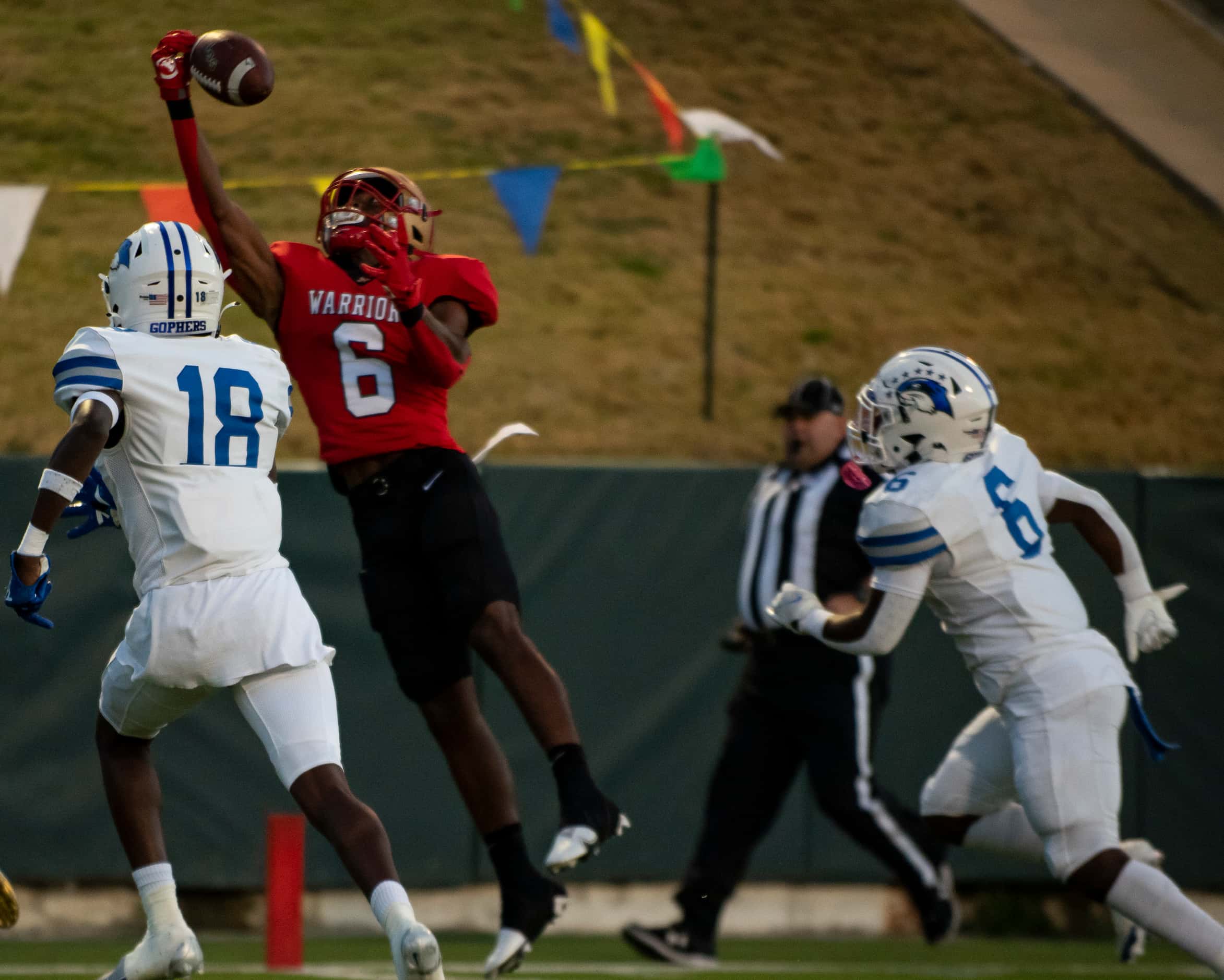 South Grand Prairie junior AJ Newberry (6) extends in the air to catch a pass during South...