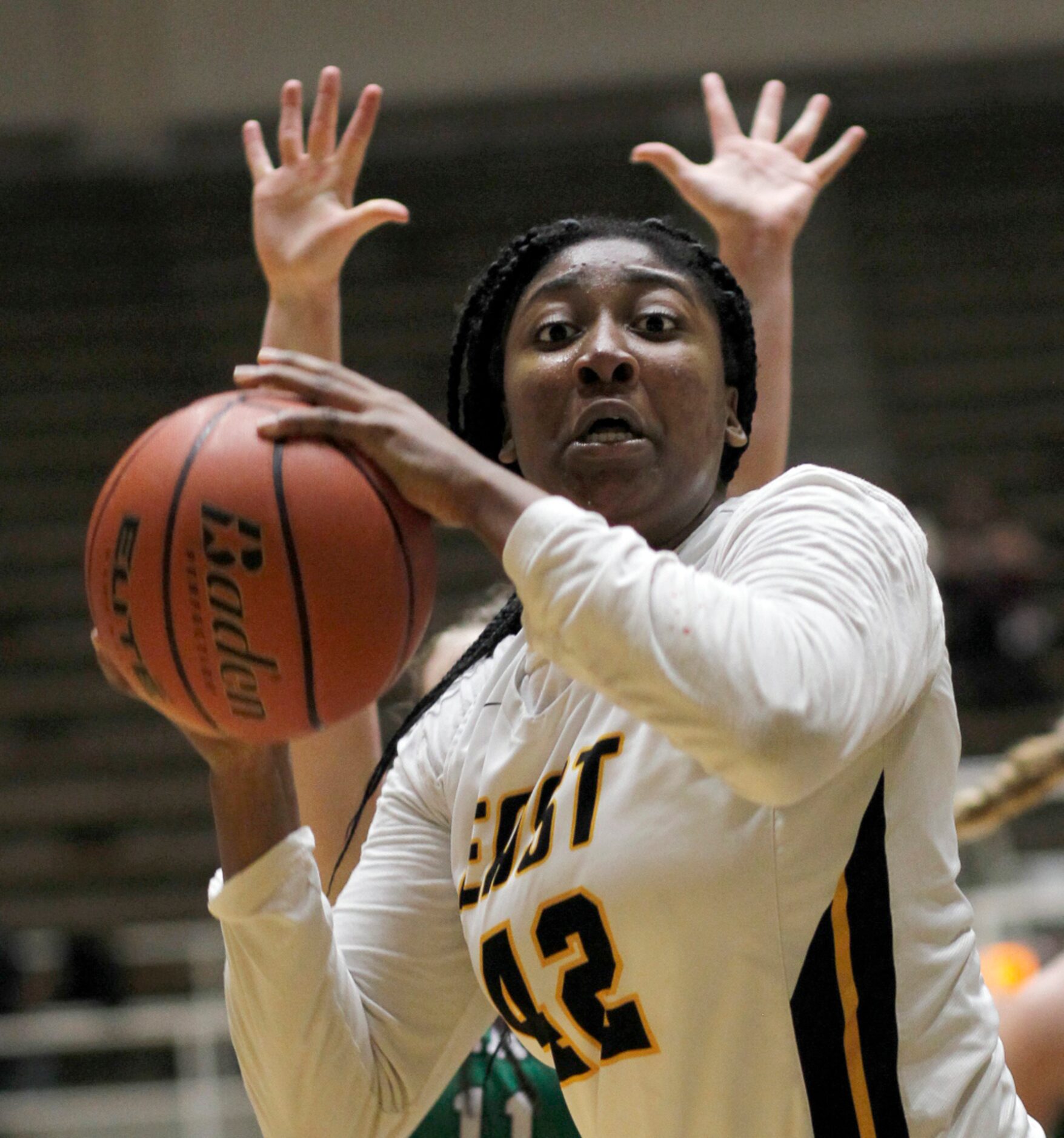 Plano East forward Idara Udo (42) reacts as she is trapped under the basket during first...