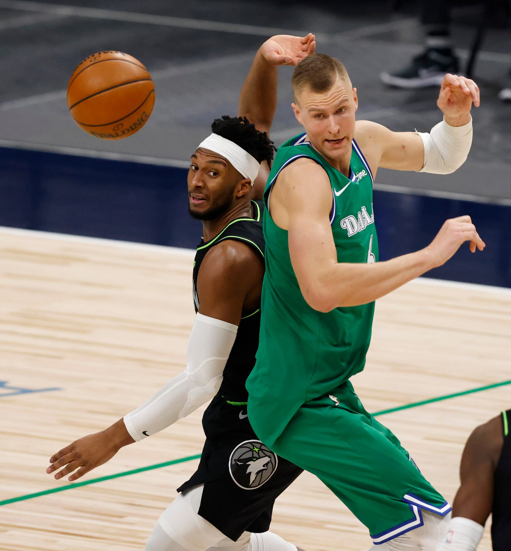 Dallas Mavericks forward Kristaps Porzingis (6) and Minnesota Timberwolves forward Josh...