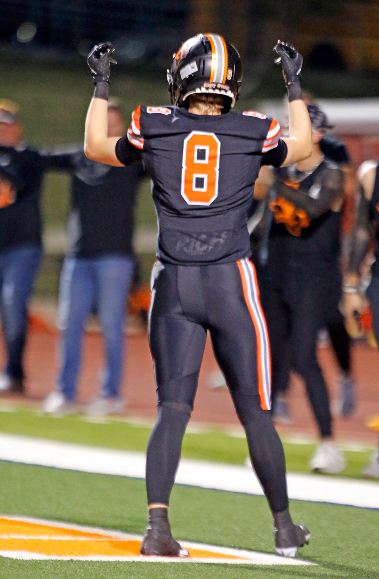 Rockwall High’s Triston Gooch celebrates after his touchdown catch during the first half of...