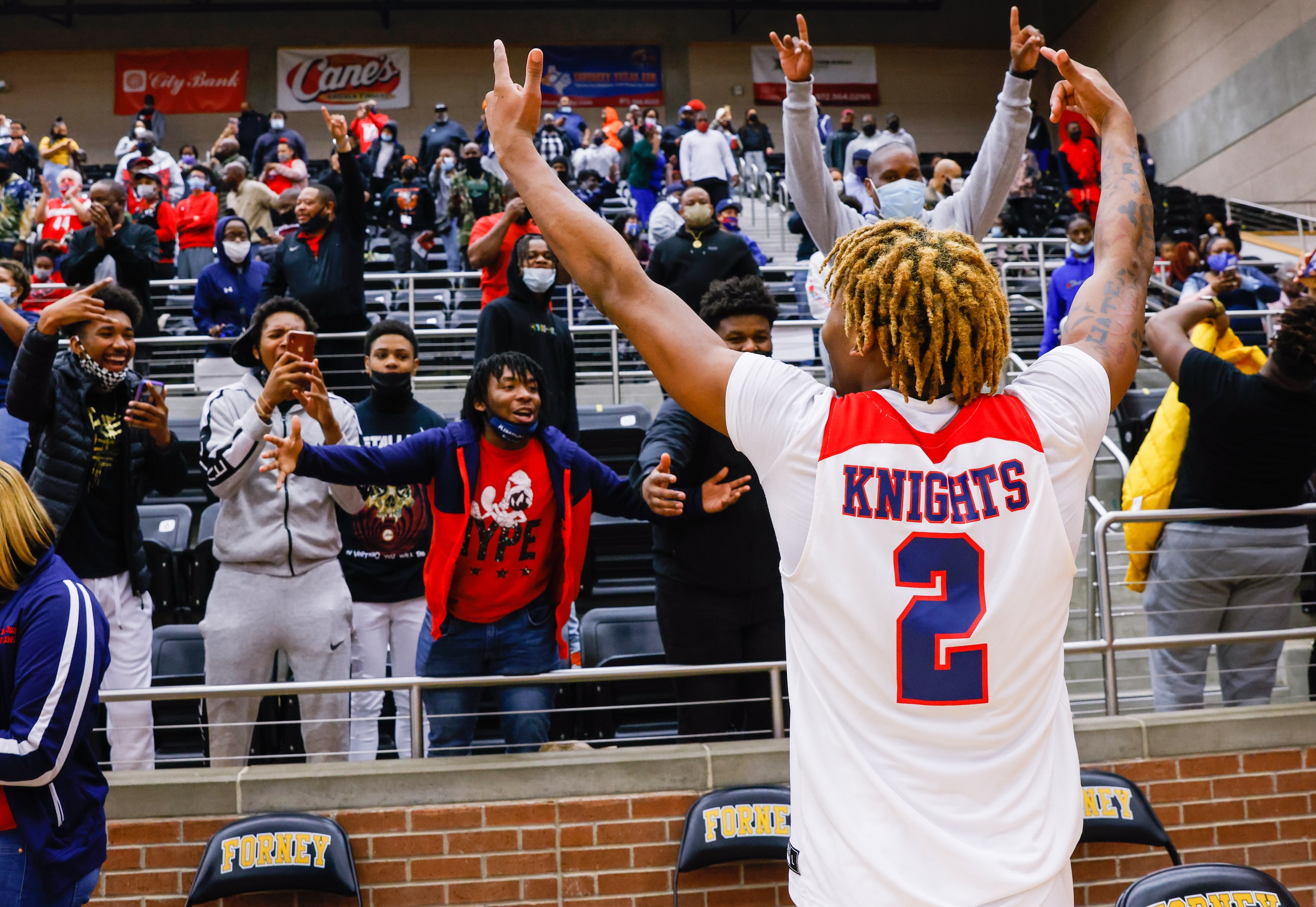 Kimball's Arterio Morris (2) celebrates his team's win over Lancaster during overtime of a...