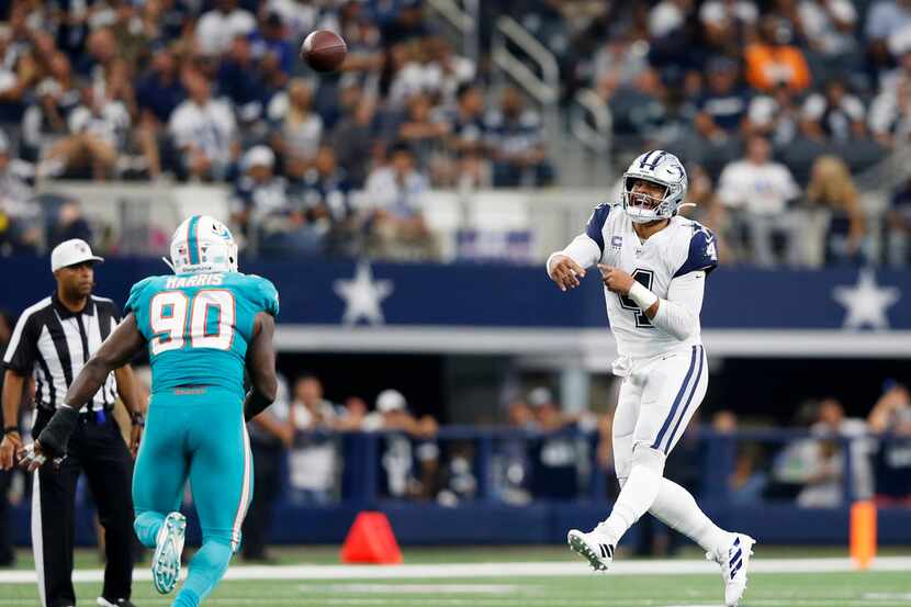 Dallas Cowboys quarterback Dak Prescott (4) attempts a pass during the second half of play...